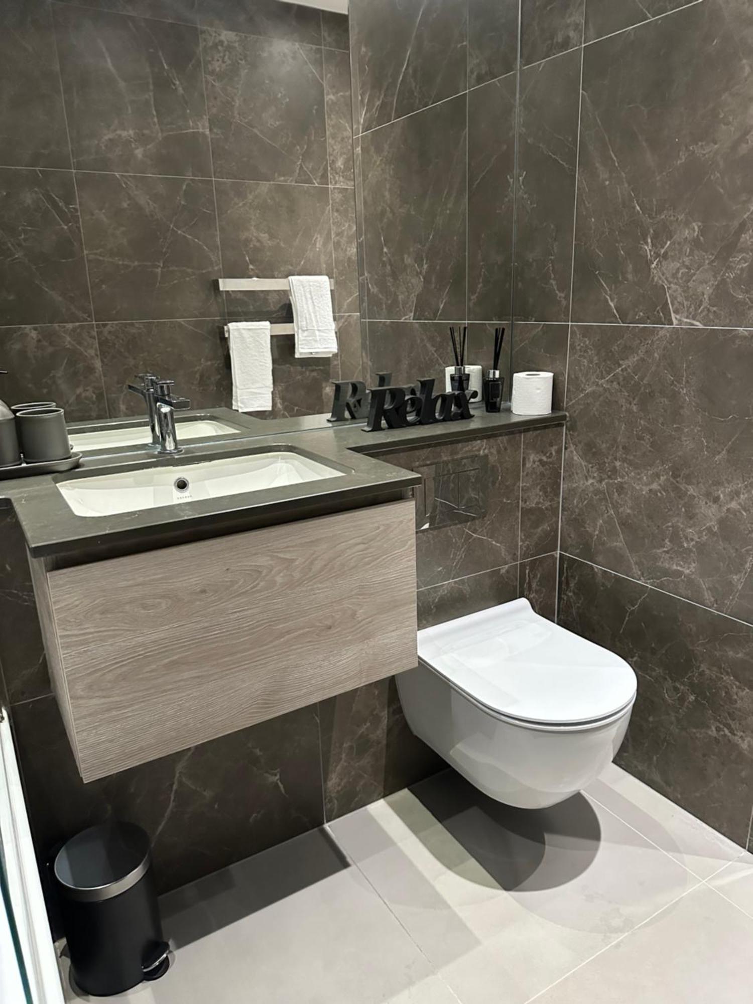 Richardson Deluxe Apartments Londra Esterno foto